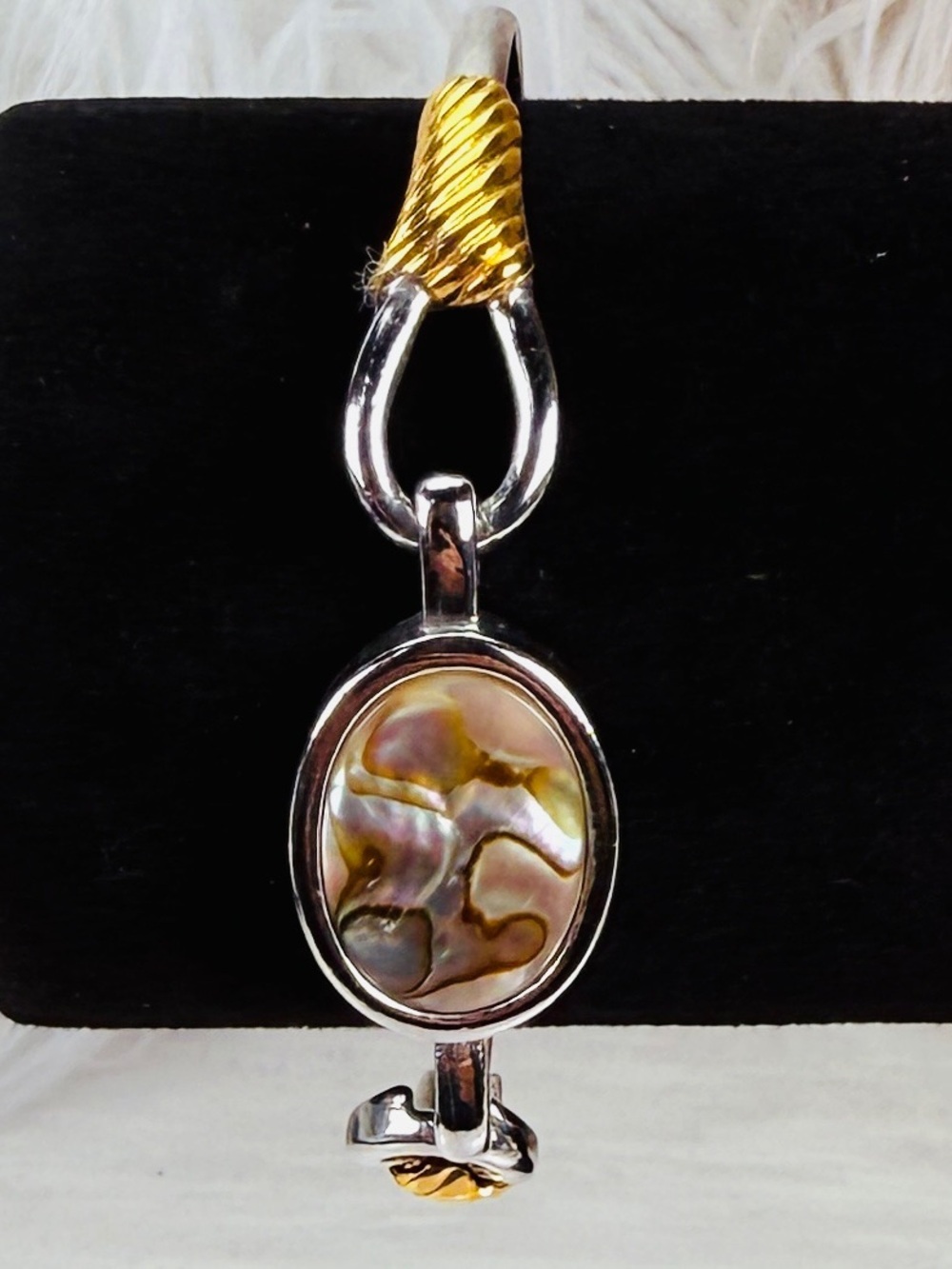 Beautiful vintage Avon Silvertone and goldtone abalone bracelet